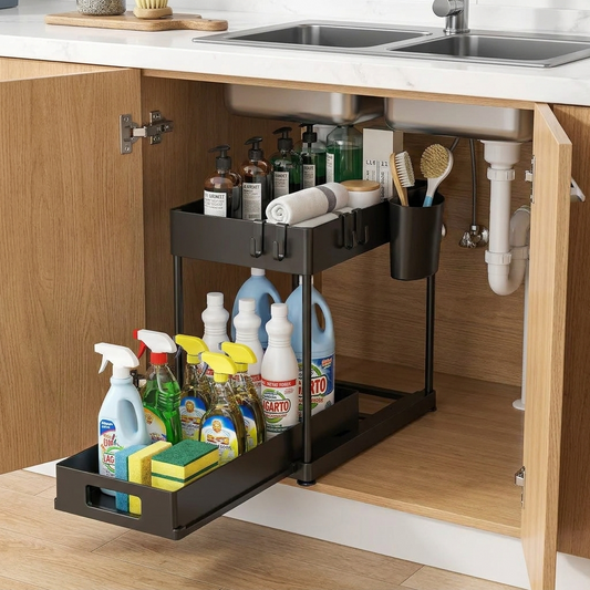 Pull-out under-sink organizer extended with cleaning supplies arranged inside